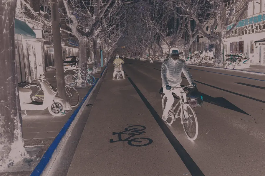 January 24, 2020 - Shanghai, China: A man on a bicycle wears a protective face mask in wake of the coronavirus outbreak rides along a deserted Fuxing Road in the former French Concession on the eve of the Chinese Lunar New Year. Yesterday the Chinese government took the unprecedented step of quarantining the entire city of Wuhan (population around 11 million) in an effort to stop the spread of the coronavirus beyond the city of its origin. There are fears that the coronavirus may spread through out China and beyond during the Chinese Lunar New Year holidays - the world&rsquo;s largest annual migration. Chinese citizens were expected to make around 3 billion trips over the 40 day holiday period. (Dave Tacon/Contacto)
ONLY FOR USE IN SPAIN

January 24, 2020 - Shanghai, China: A man on a bicycle wears a protective face mask in wake of the coronavirus outbreak rides along a deserted Fuxing Road in the former French Concession on the eve of the Chinese Lunar New Year. Yesterday the Chinese government took the unprecedented step of quarantining the entire city of Wuhan (population around 11 million) in an effort to stop the spread of the coronavirus beyond the city of its origin. There are fears that the coronavirus may spread through out China and beyond during the Chinese Lunar New Year holidays - the world&rsquo;s largest annual migration. Chinese citizens were expected to make around 3 billion trips over the 40 day holiday period. (Dave Tacon/Contacto)

1/24/2020 ONLY FOR USE IN SPAIN