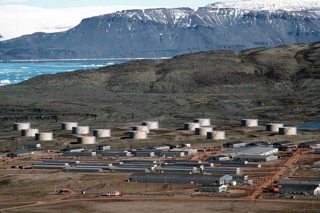 an-aerial-view-of-buildings-and-storage-tanks-at-thule-air-base-cd50d9-1600