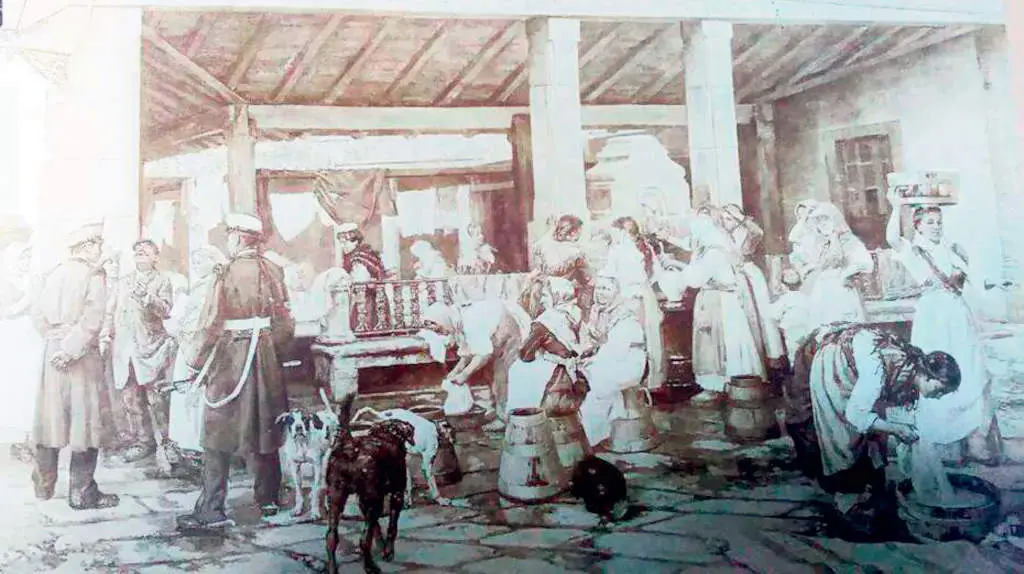 Fotograf&iacute;a sobre un lenzo en paradoiro desco&ntilde;ecido no 
que Rom&aacute;n Navarro recoll&iacute;a 
a vida coti&aacute; do lavadoiro 
do Caramanch&oacute;n (Foto: cedida).