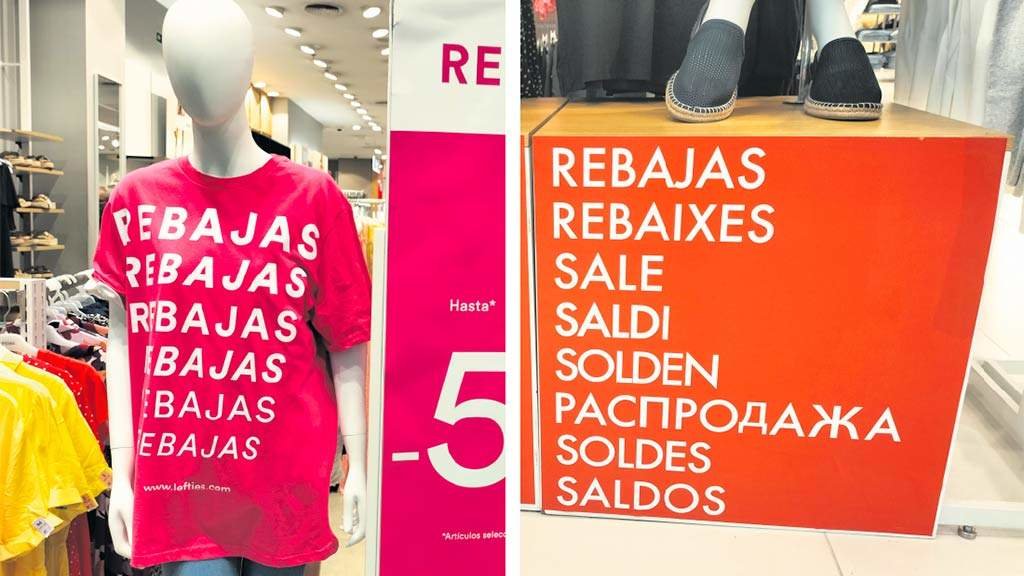 Carteis de rebaixas este sábado en dúas tendas dun centro comercial de Santiago (Foto: Nós Diario).