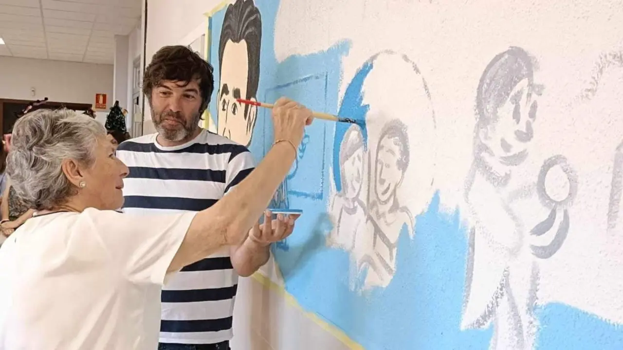 Amalia B&oacute;veda e Carlos Taboada, ilustrador de Polo Correo do Vento, no CEIP Alexandre B&oacute;veda de Redondela. (Foto: Polo Correo do Vento).